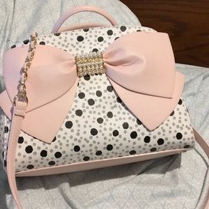 Betsy Johnson pink handbag with a bow
